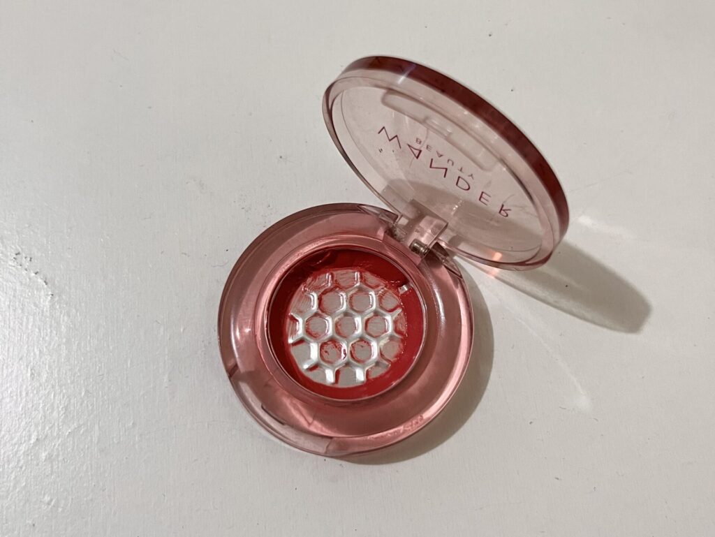 Wander Beauty mini Double Date Lip and Cheek shade Spring Fling with lid open on white surface