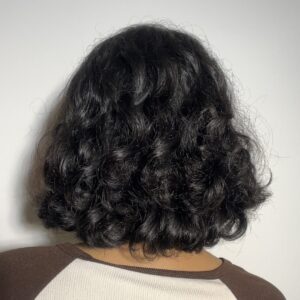 Full back view of curly hair after 5 hours of using Moroccan Hydrating Elastin Curl Cream