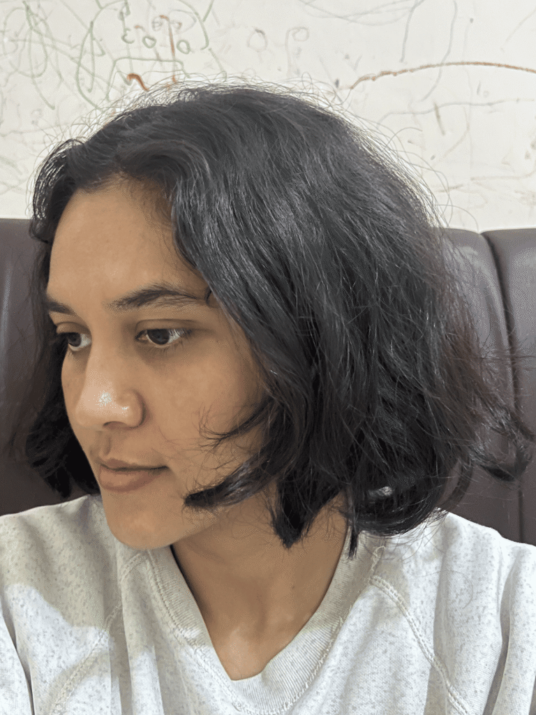 My naturally wavy hair 6 hours after using Pikaru Keratin Anti-Frizz Pro Hair Cream, showing the remaining anti-frizz effect.