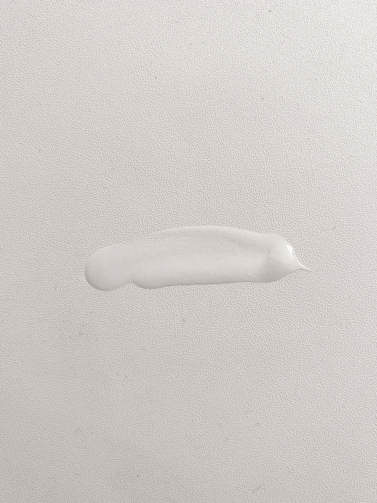 Swatch of Cetaphil Gentle Skin Cleanser texture on a white surface, showing its smooth, creamy consistency.